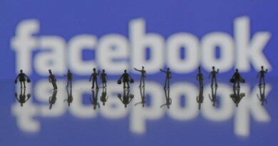 3D-printed models of people are seen in front of a Facebook logo in this photo illustration taken June 9, 2016. REUTERS/Dado Ruvic/Illustration