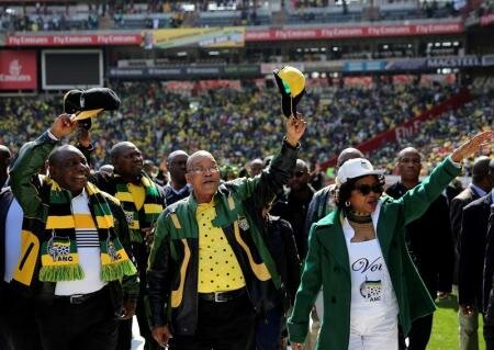 African National Congress (ANC) president Jacob Zuma (C) waves to his supporters next to his deputy, Cyril Ramaphosa (L) REUTERS/Siphiwe Sibeko - File photo