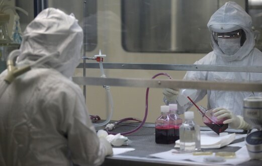 Men work on the production of Yellow Fever vaccine at a laboratory in Oswaldo Cruz Foundation (Fiocruz) in Rio de Janeiro, Brazil, February 7, 2017. Picture taken February 7, 2017. REUTERS/Ricardo Moraes